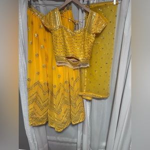 Yellow lehnga choli.
